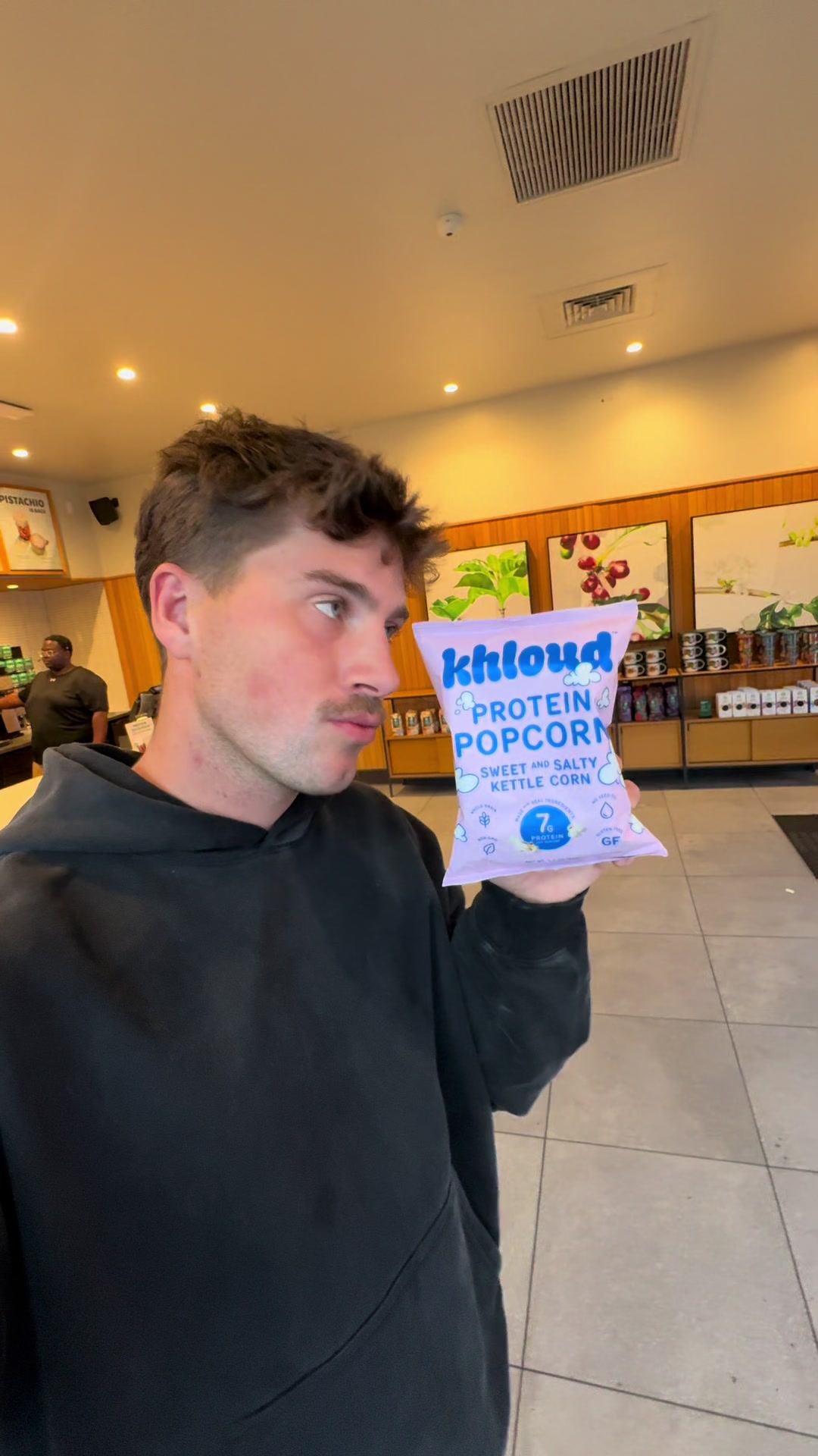 TikTok post by @flydaddynick for KhloudFoods. Caption reads: Come and try @KhloudFoods with me at @Starbucks....