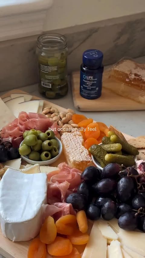 Instagram post by @nourishedbynutrition for Life Extension. Caption reads: Ever feel “off” after a charcuterie board?
It....