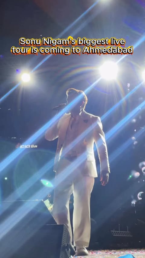 Instagram post by @amdavad_with_amdavadi for BookMyShow. Caption reads: Ahmedabad, are you ready? @sonunigamofficial LIVE....