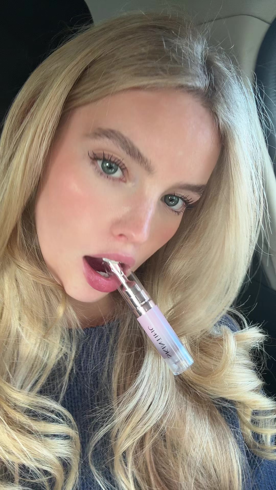 TikTok post by @zoeehaggerr for Skintific. Caption reads: [...] toast brick brightening lip serum from....