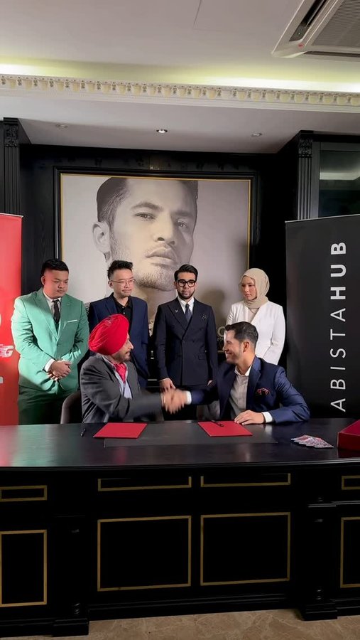 Instagram post by @aliffsyukriterlajaklaris for HIJABISTAHUB. Caption reads: [...] to announce a collaboration between....