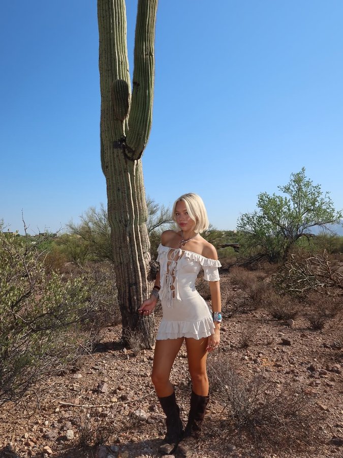 Instagram post by @averykkroll for Outcast Clothing. Caption reads: BTS with @outcastclothing <3 soo cute for this....