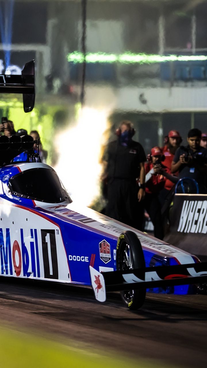 Instagram post by @tsrnitro for Dodge. Caption reads: [...] | @tsrnitro @texasmotorplex | @nhra....
