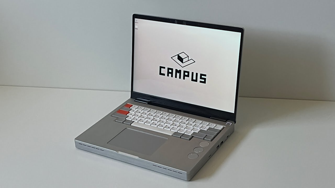 YouTube post by @flurples for JLCPCB. Caption reads: I made a mechanical laptop.