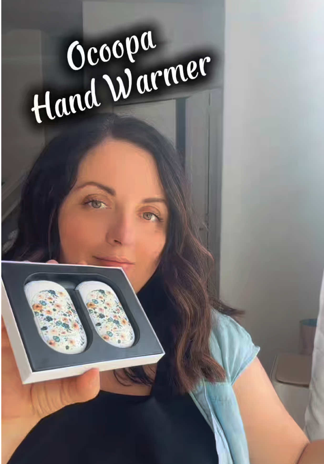 TikTok post by @annac_ugc for Ocoopa. Caption reads: [...] fits right in your palm.  @warmwithocoopa....