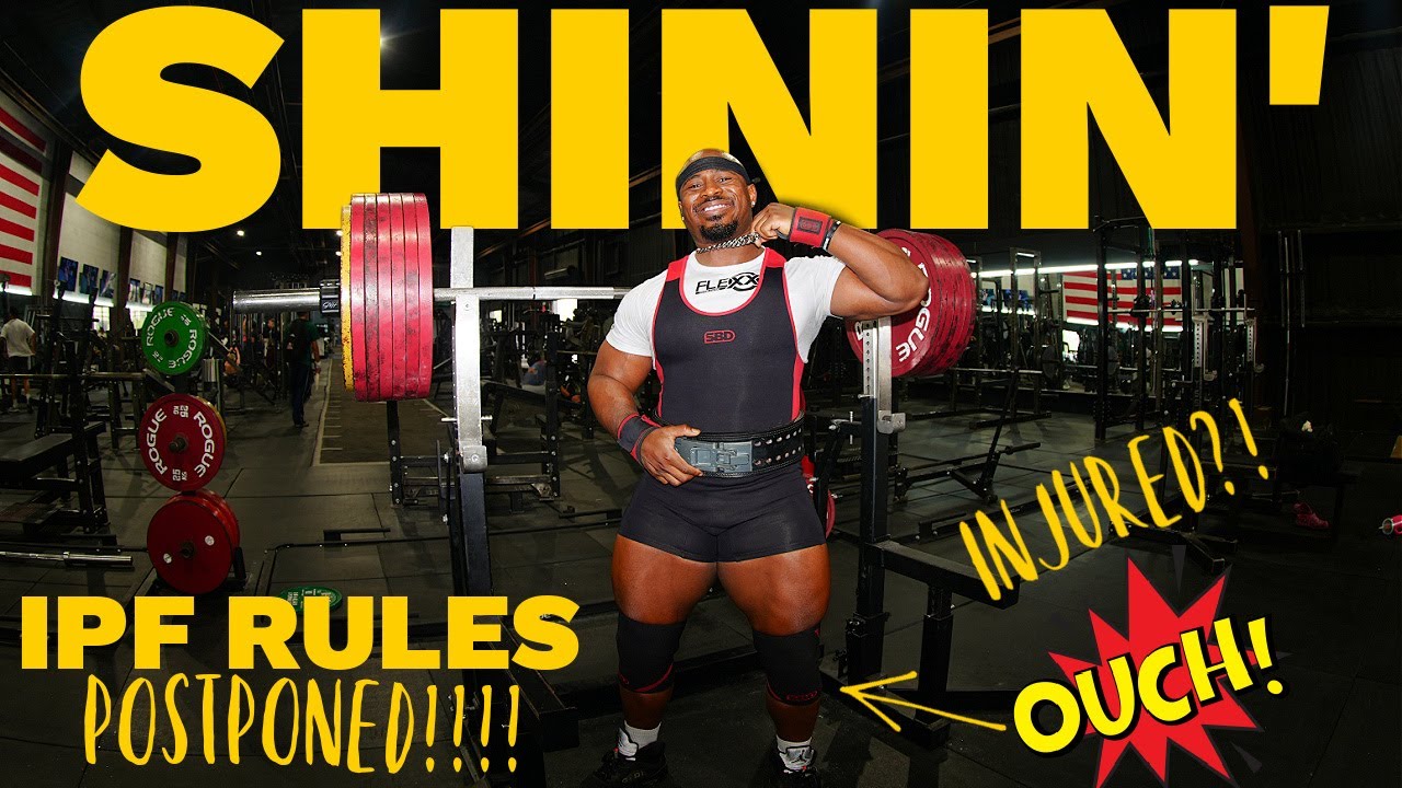 YouTube post by @RusselOrhii for SBD Apparel. Caption reads: IPF RULES POSTPONED!? KNEE INJURY 3 WEEKS OUT?! |....
