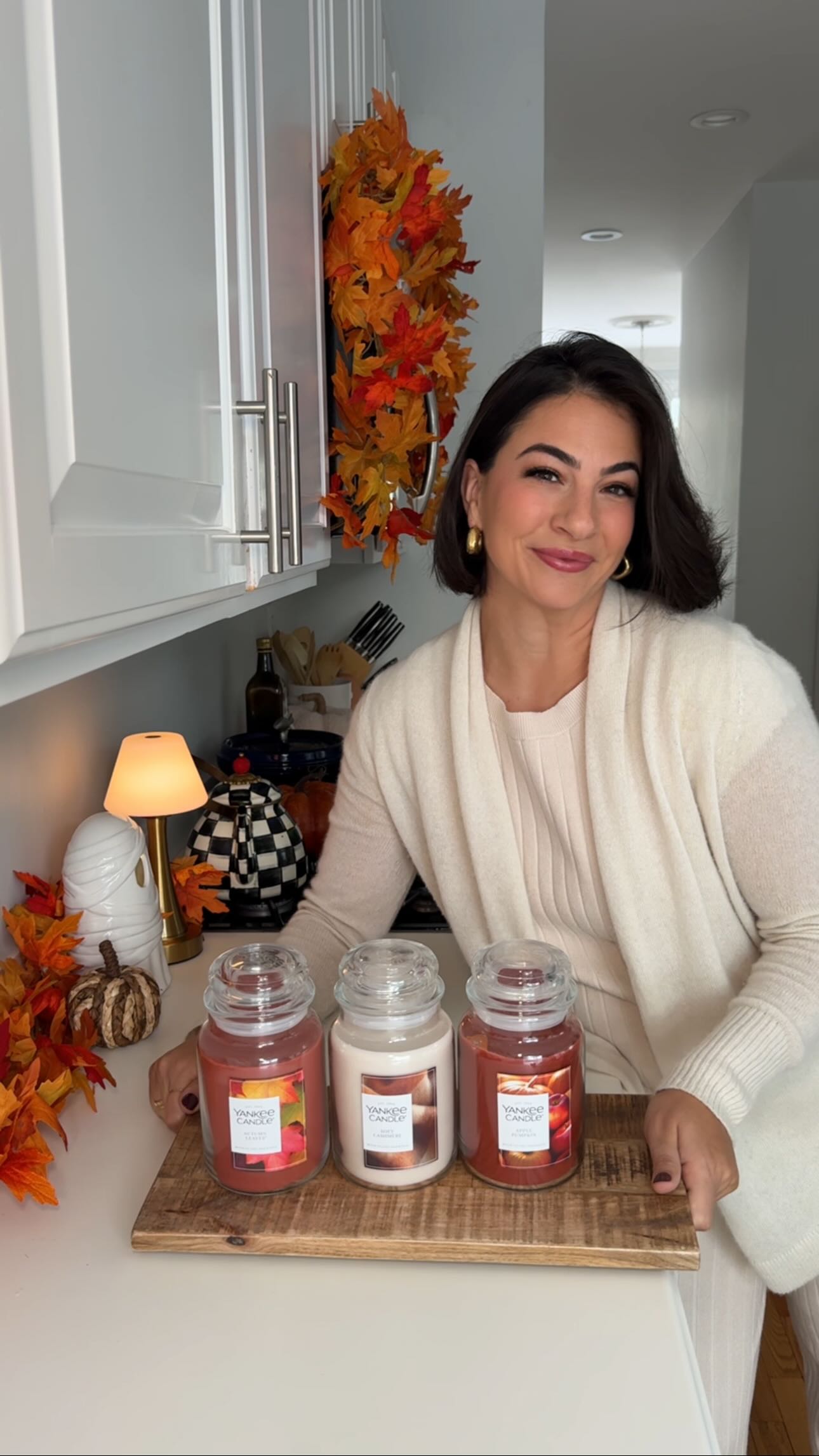 Instagram post by @over30momtips for Yankee Candle. Caption reads: Love fall candles? Comment LINK for @yankeecandle....