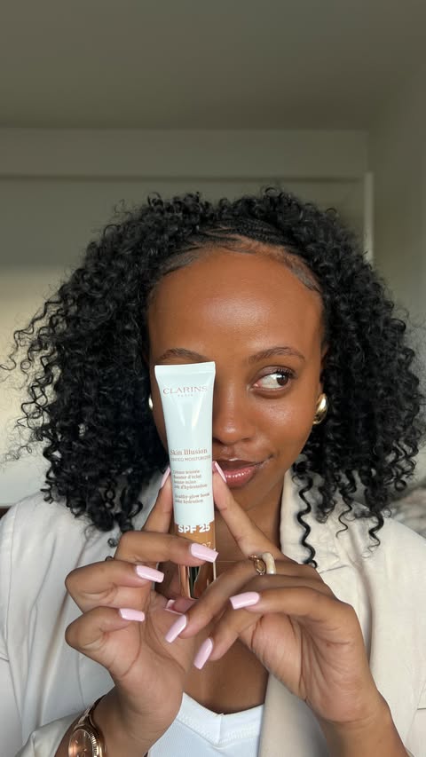 Instagram post by @thandolwethulmajola for Clarins. Caption reads: [...] call minimum effort, maximum glow😍 the....