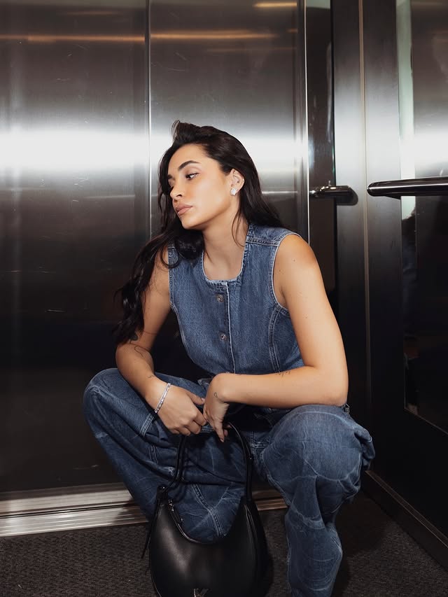 Instagram post by @she.s.benni for KARL LAGERFELD. Caption reads: elevator archives in @karllagerfeld #karllagerfeld....