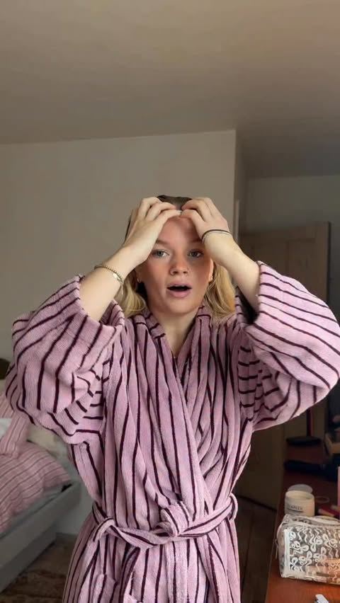 Instagram post by @marthaawalsh for OLAPLEX. Caption reads: lil bun tutorial 😆 
I used @olaplex hair mask....