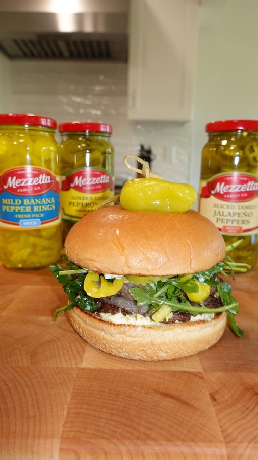 Instagram post by @emmanuel.duverneau for Mezzetta. Caption reads: These @mezzetta peppers add a sweet and tangy....