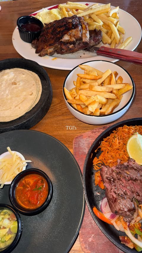 Instagram post by @katielouisewood_ for TGI Fridays. Caption reads: a little family trip to @tgifridaysuk for some....