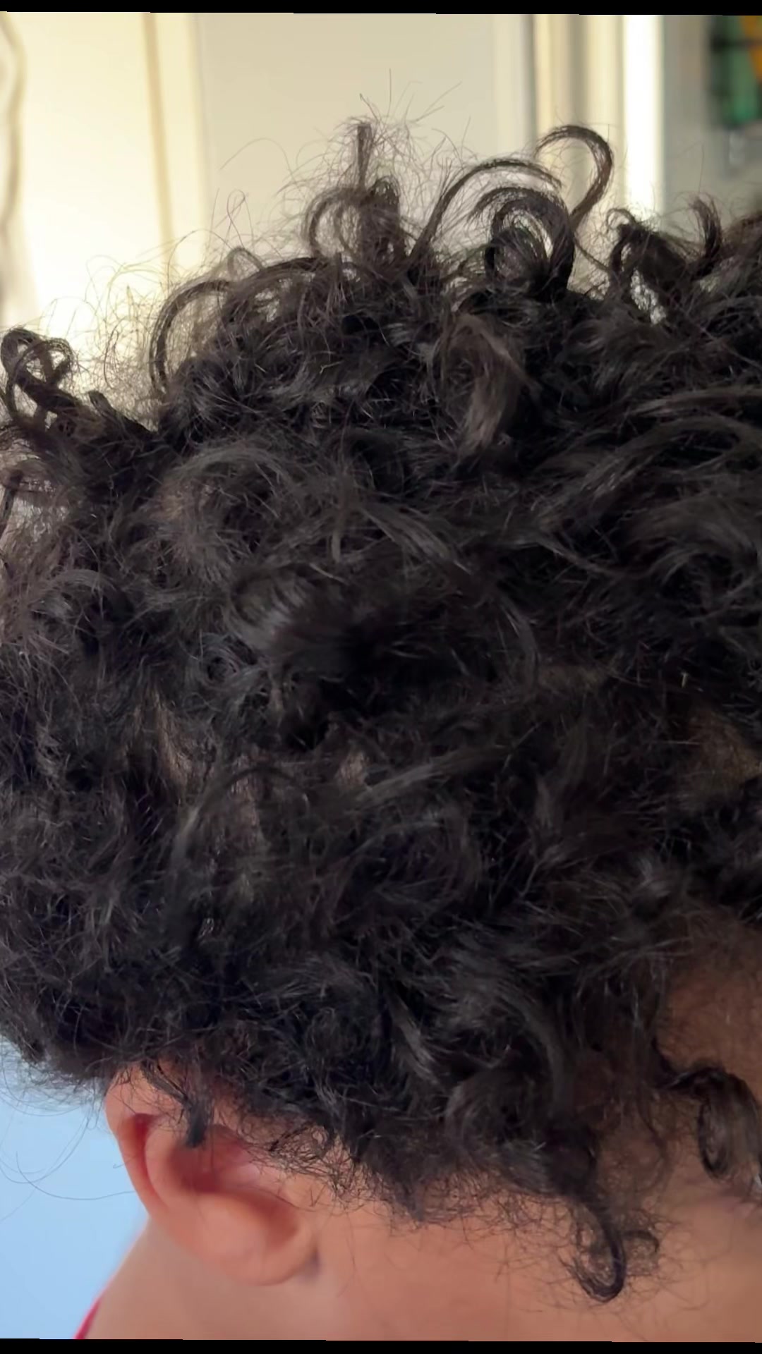 TikTok post by @daniellerene00 for DevaCurl. Caption reads: #DevaCurl #UltraDefiningGel #CurlyHair [...].