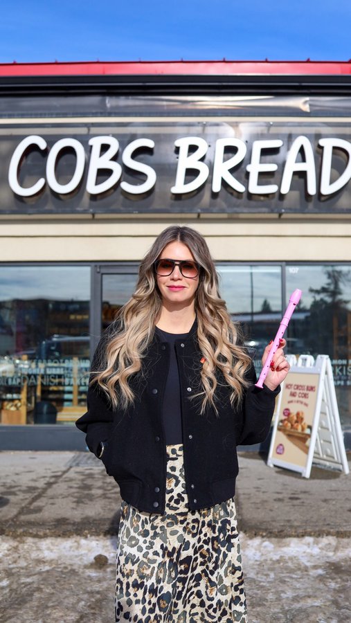 Instagram post by @pursuingpretty for Cobs Bread. Caption reads: [...] your FREE Hot Cross Bun! On March 1st....