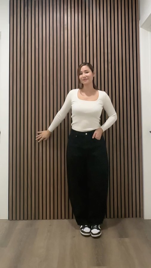 Instagram post by @kryskhloe for WoodUpp. Caption reads: [...] hobby is elevating a plain, white wall....