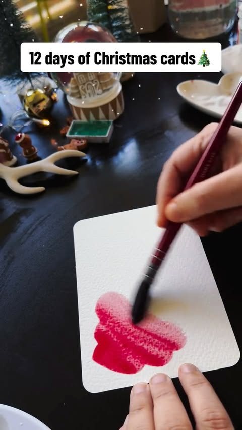 Instagram post by @chelseyfreyta for Kuretake ZIG. Caption reads: Come paint Xmas with me?? 🩷🎅🏼

Paint....