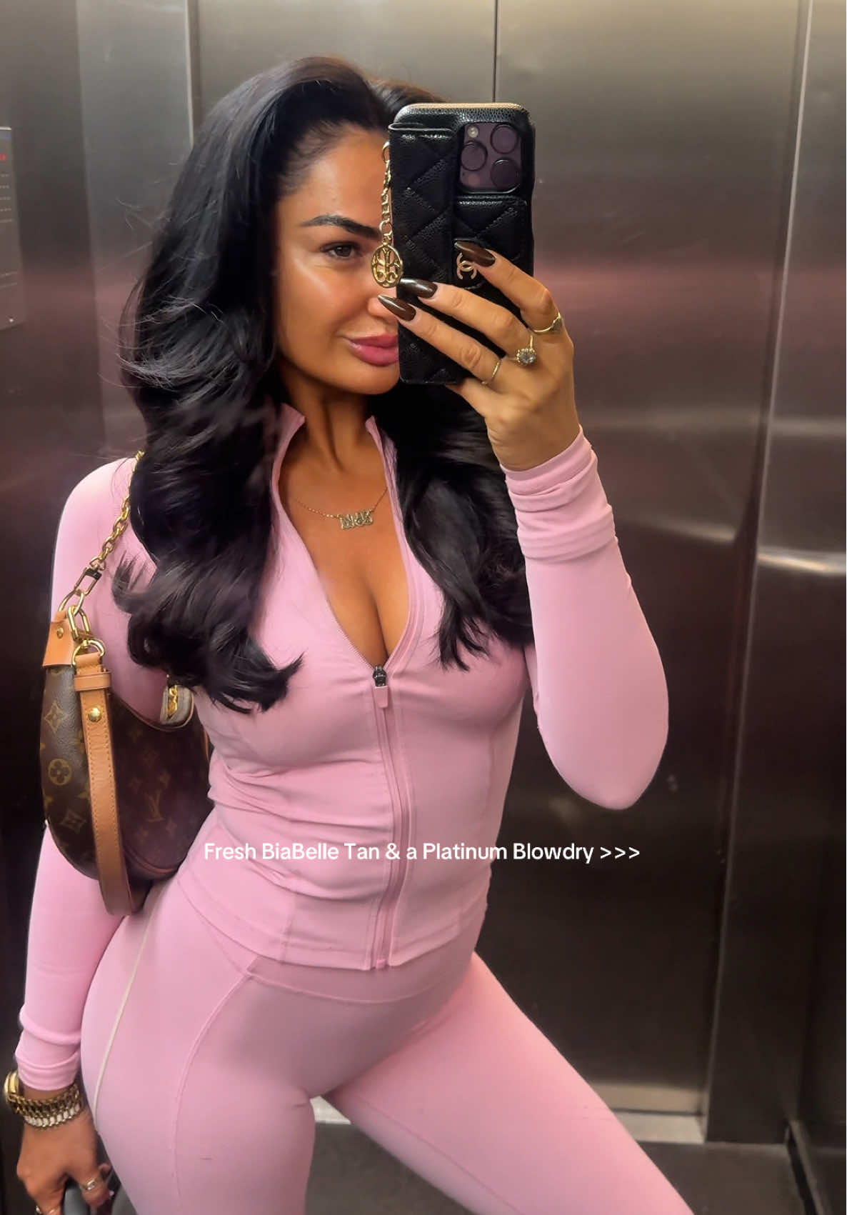 TikTok post by @blamurphy for BiaBelle Beauty. Caption reads: @BiaBelle Tan & @PLATINUM EXPERT HAIR blowdry -....