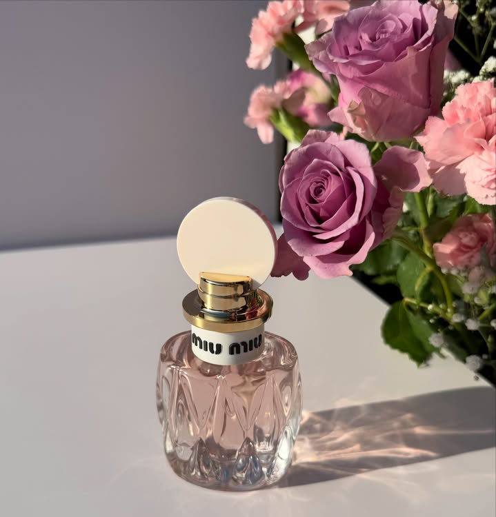 Instagram post by @kasias_testing_lab for Miu Miu. Caption reads: [...] how I imagine summer should smell. Miu Miu....
