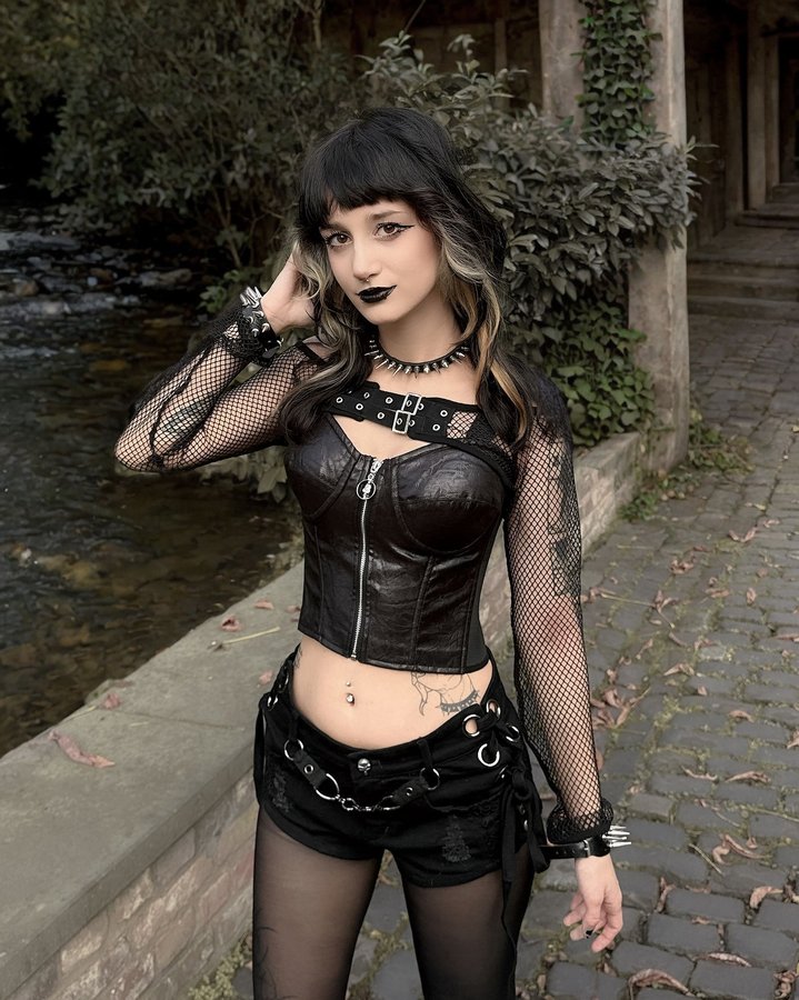 Instagram post by @nihilisticfae for FANTASMAGORIA. Caption reads: [...] character forever 🌿🖤

outfit:....