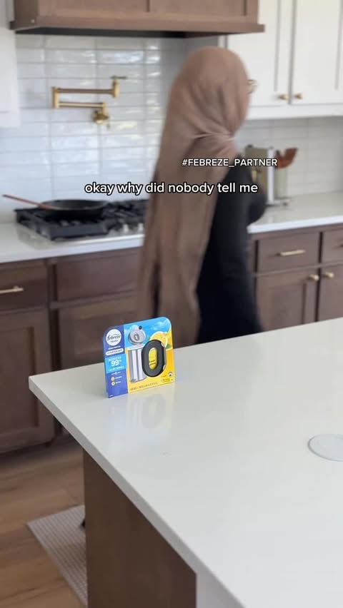Instagram post by @hibakayf for Febreze. Caption reads: #FEBREZE_PARTNER As a twin toddler mom my kitchen....