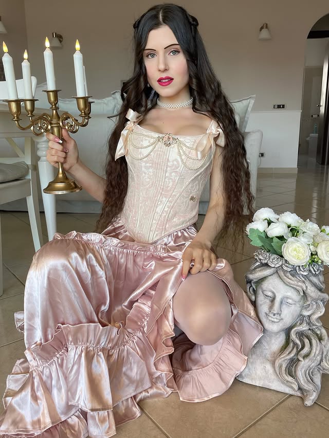 Instagram post by @arual.bloom for Lacemade. Caption reads: [...] a portrait?🕯️💕 Corset and Skirt by....