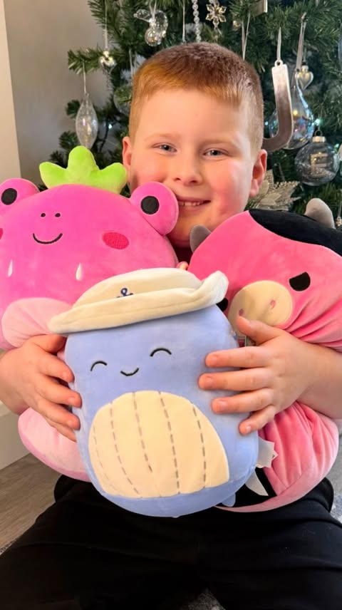 Instagram post by @two_littlepickles for Squishmallows. Caption reads: [...] Josh loves just how super soft....