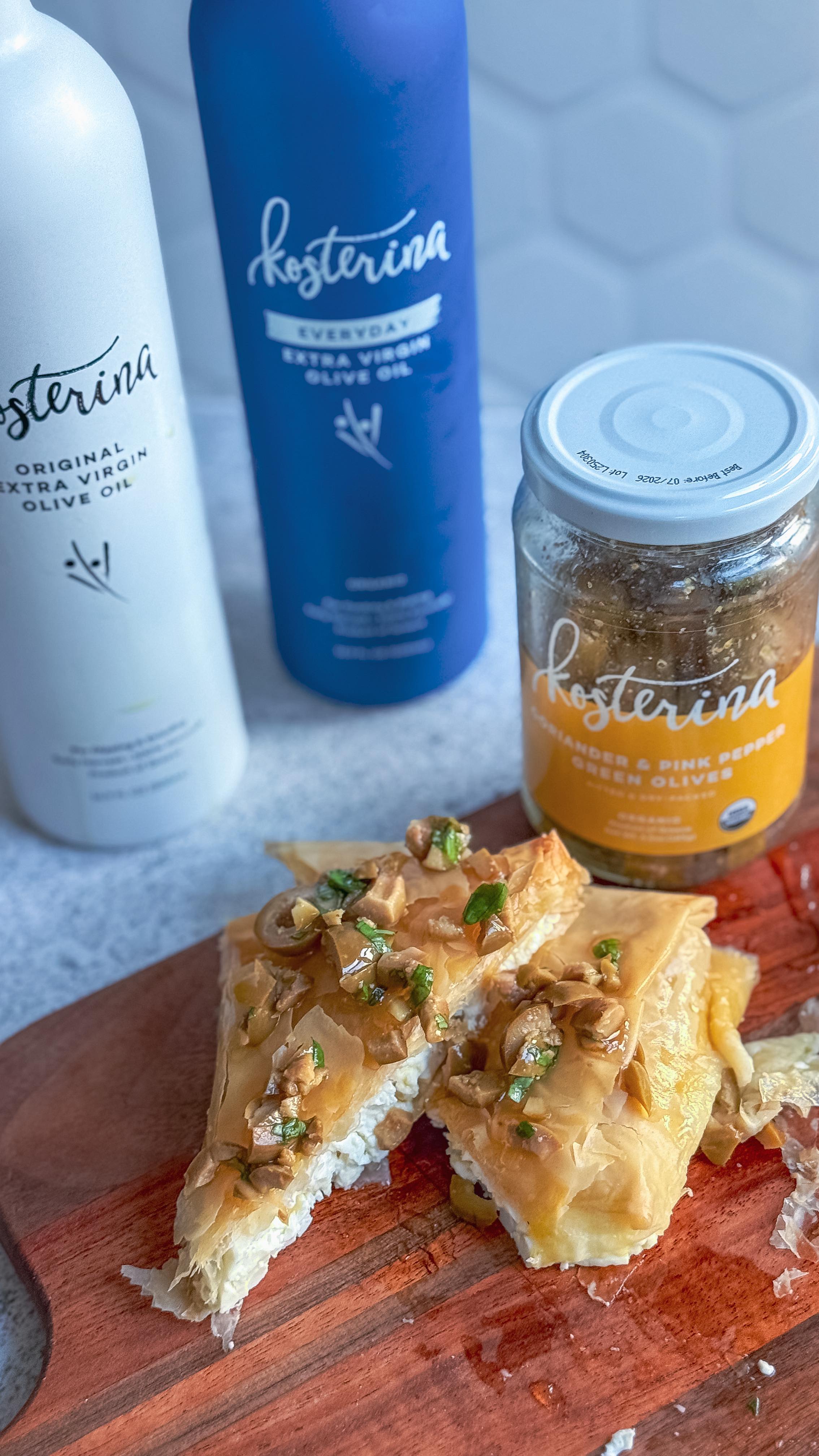 Instagram post by @makefoodlovely for Kosterina. Caption reads: 🇬🇷 🫒 BAKED FETA 🫒 🇬🇷 

this appetizer will....