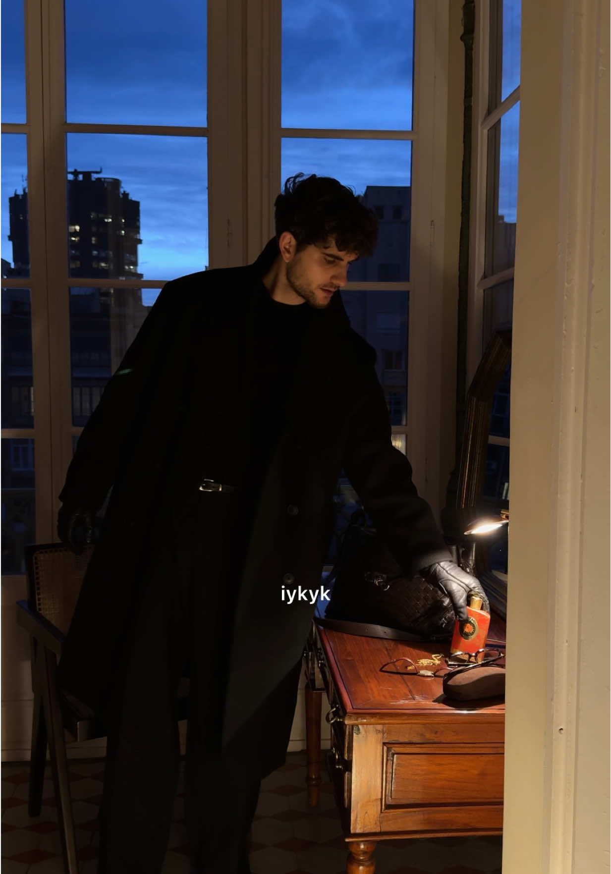 TikTok post by @niklinio for DOUGLAS. Caption reads: [...] one 🖤 *ad #Atkinsons1799 #AmbreRoyal....