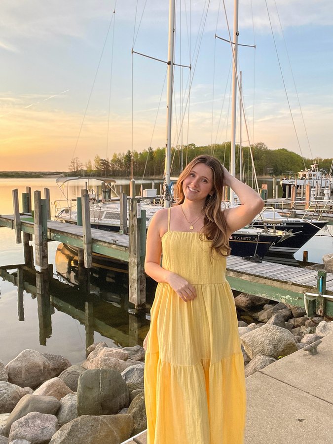 Instagram post by @kaylyn_.m for Albion Fit. Caption reads: [...] things.🌊☀️
•
•
•
Dress is from @albionfit....