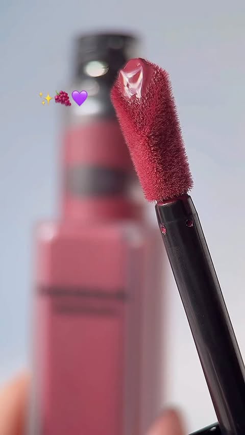 Instagram post by an influencer for YSL Beauty. Caption reads: Berrylicious 🍇💜@yslbeauty Make Me Blush Liquid....