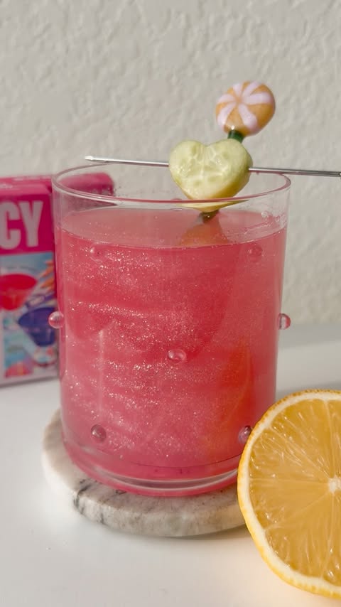 Instagram post by @thespritzeffect for Fancy Sprinkles. Caption reads: [...] top with coconut water and add....