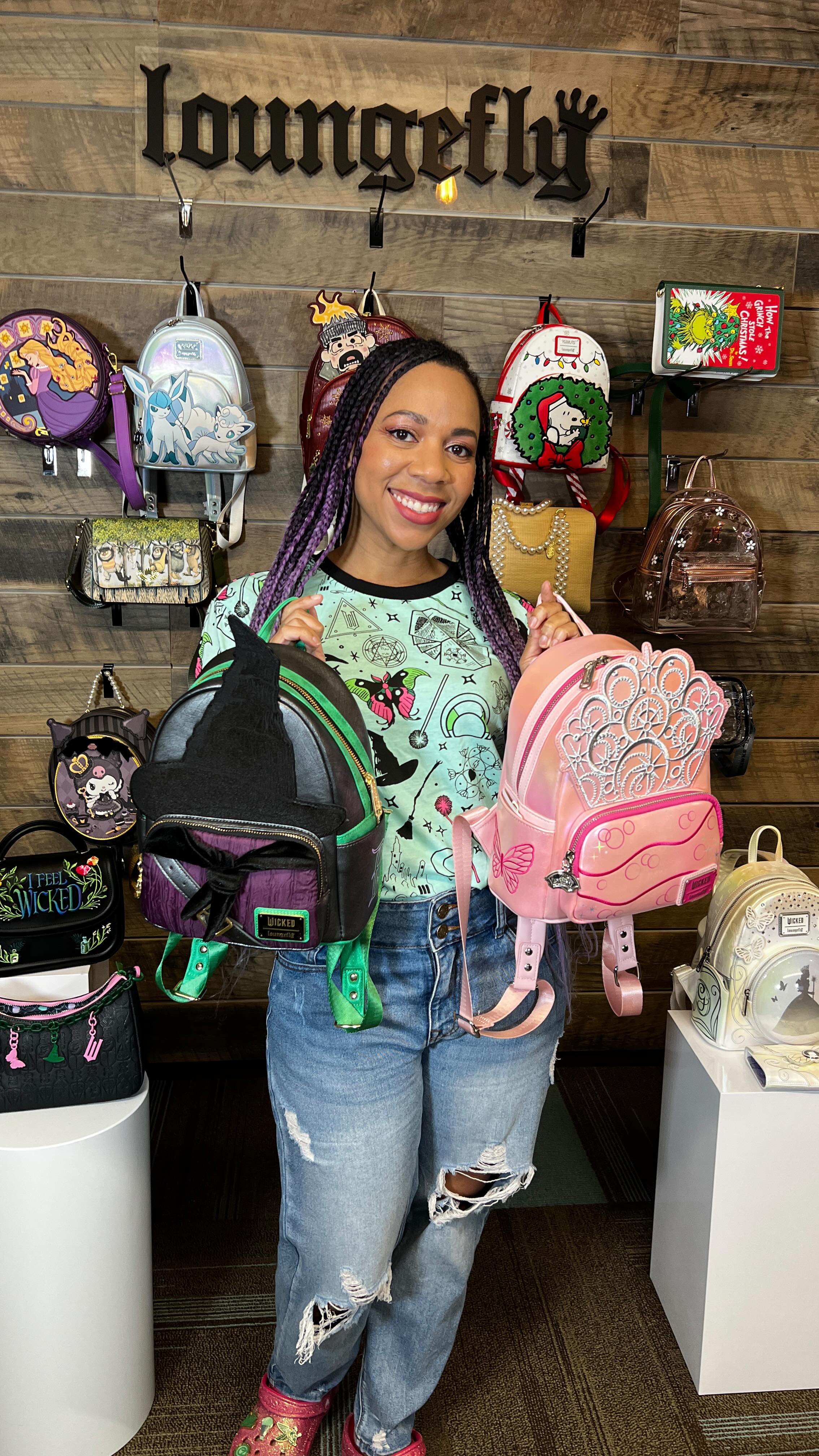 Instagram post by @followtheyellowbrickgirl for loungefly. Caption reads: We’re obsessulated! 💚🩷 Thanks to....