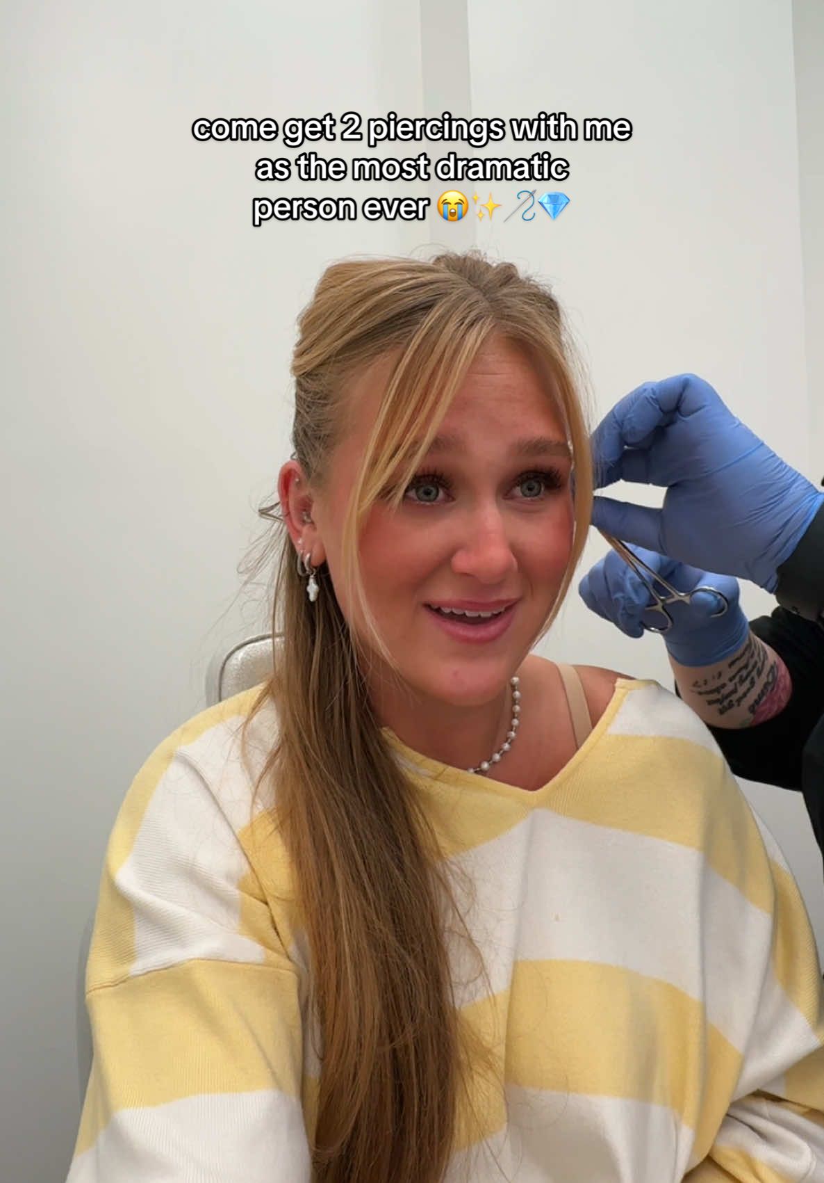 TikTok post by @caiti_mackenzie for Studs. Caption reads: been wanting some new piercings!! 🪡✨ they HURT....