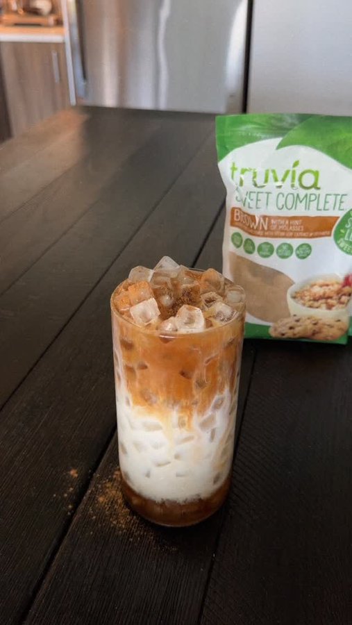 Instagram post by @foodieeshh for Truvia. Caption reads: Low Calorie Cinnamon Dolce Iced Latte....
