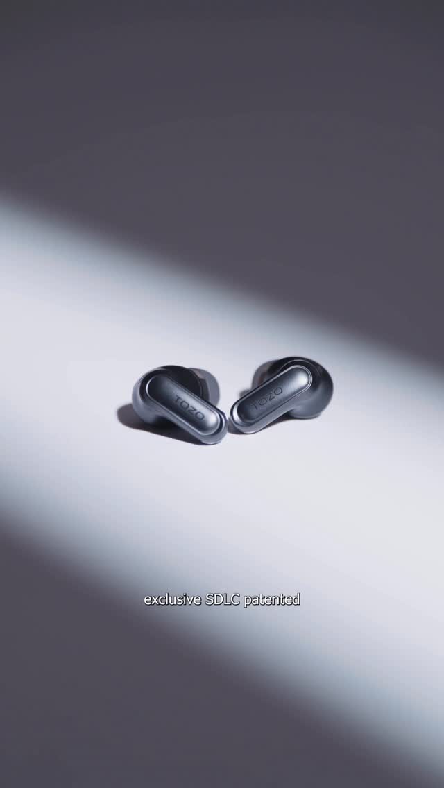 Instagram post by @ogrobbytv for TOZOSTORE. Caption reads: Best Earbuds @tozo_official #TOZO #TOZONC20....