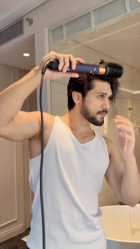 Instagram post by @rohit_bhere for Dyson. Caption reads: [...] style in seconds. 💨💈 Powered by....