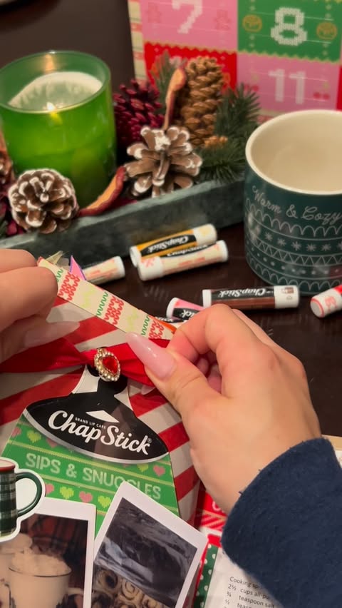 Instagram post by @madischwetzz for ChapStick. Caption reads: Junk journal with me - ChapStick ugly sweater....