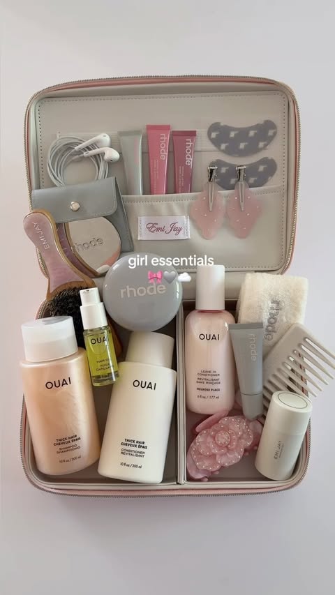 Instagram post by @carrieanne_ for OUAI. Caption reads: girl essentials 🎀🩶☁️ ft: the new @theouai leave....