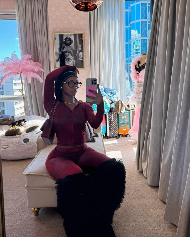 Instagram post by @1dessdior for IAMGIA. Caption reads: probably somewhere in my closet playing dress up,....