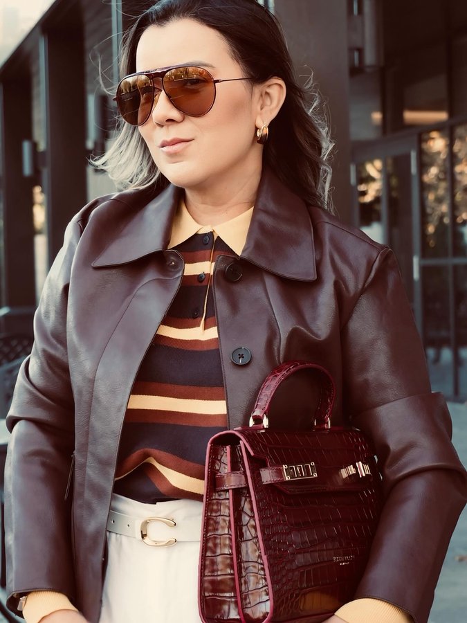 Instagram post by @prifregona for Teddy Blake. Caption reads: ✨ “In my burgundy era 🍷 This deep bordeaux shade....