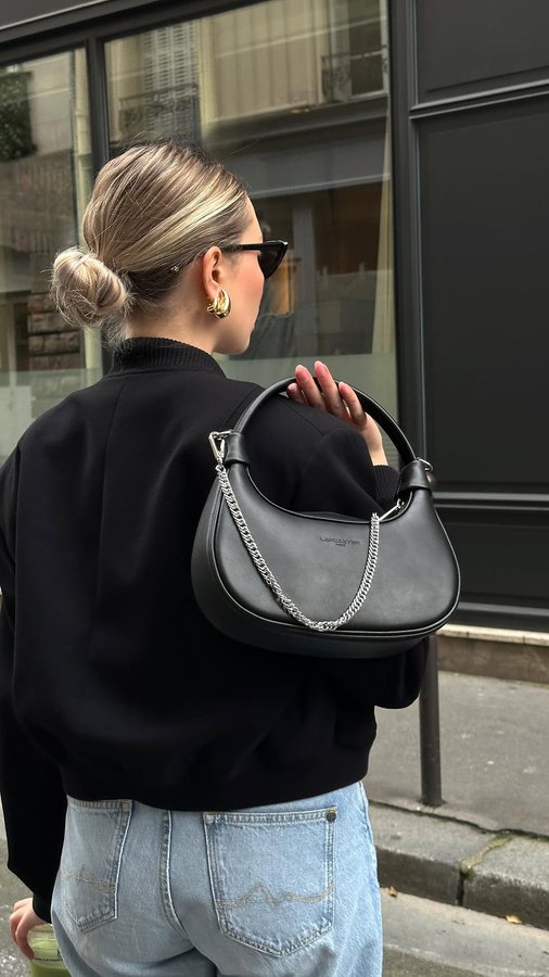 Instagram post by @marine_diet for Lancaster. Caption reads: Out and about with my Hobo bag @lancaster....