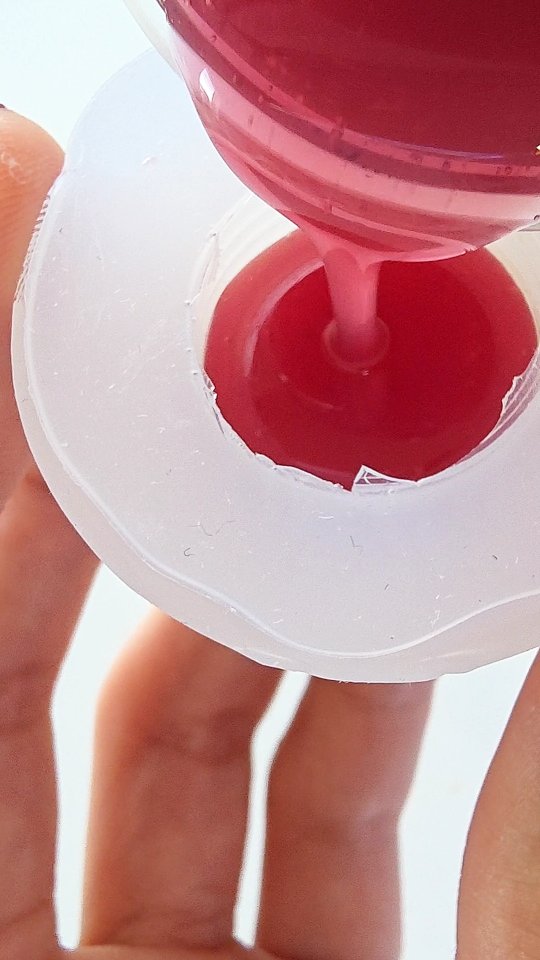 Instagram post by @chellepastel for Craft Resin. Caption reads: Cranberry Sauce Earrings, Inspired by one of my....