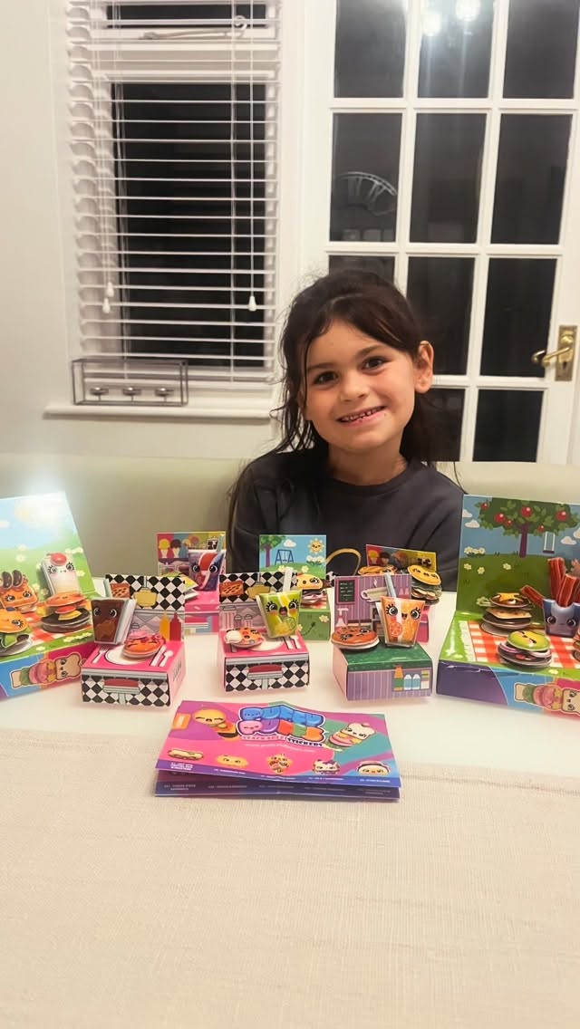 Instagram post by @thesweeneygirls for The Entertainer. Caption reads: Puffy Puffs 🍔🥤🍩

Sienna has loved building her....