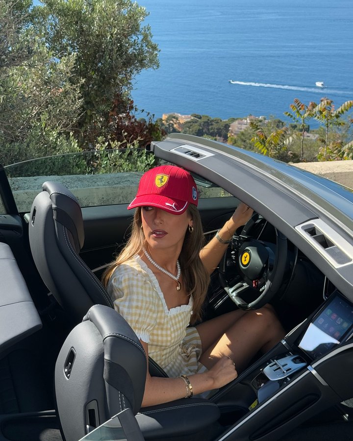 Instagram post by @keziacook for Ferrari. Caption reads: ad just taking my emotional support ferrari for a....