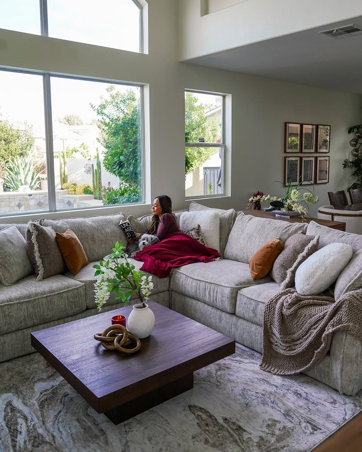 Instagram post by @renezeangeline for RC Willey. Caption reads: Our front room turned out so much better than I....