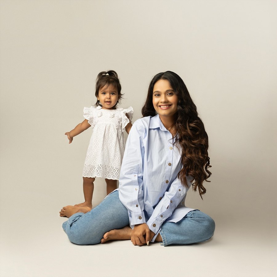 Instagram post by @nikishahdubai for UNICEF. Caption reads: Every little moment with my daughter reminds me of....