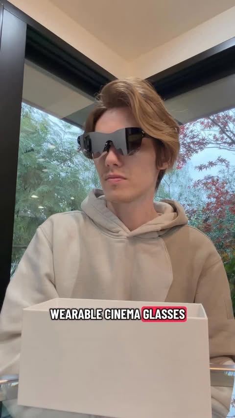 Instagram post by @hitomidocameraroll for RayNeo. Caption reads: [...] class picture for a best in class price....