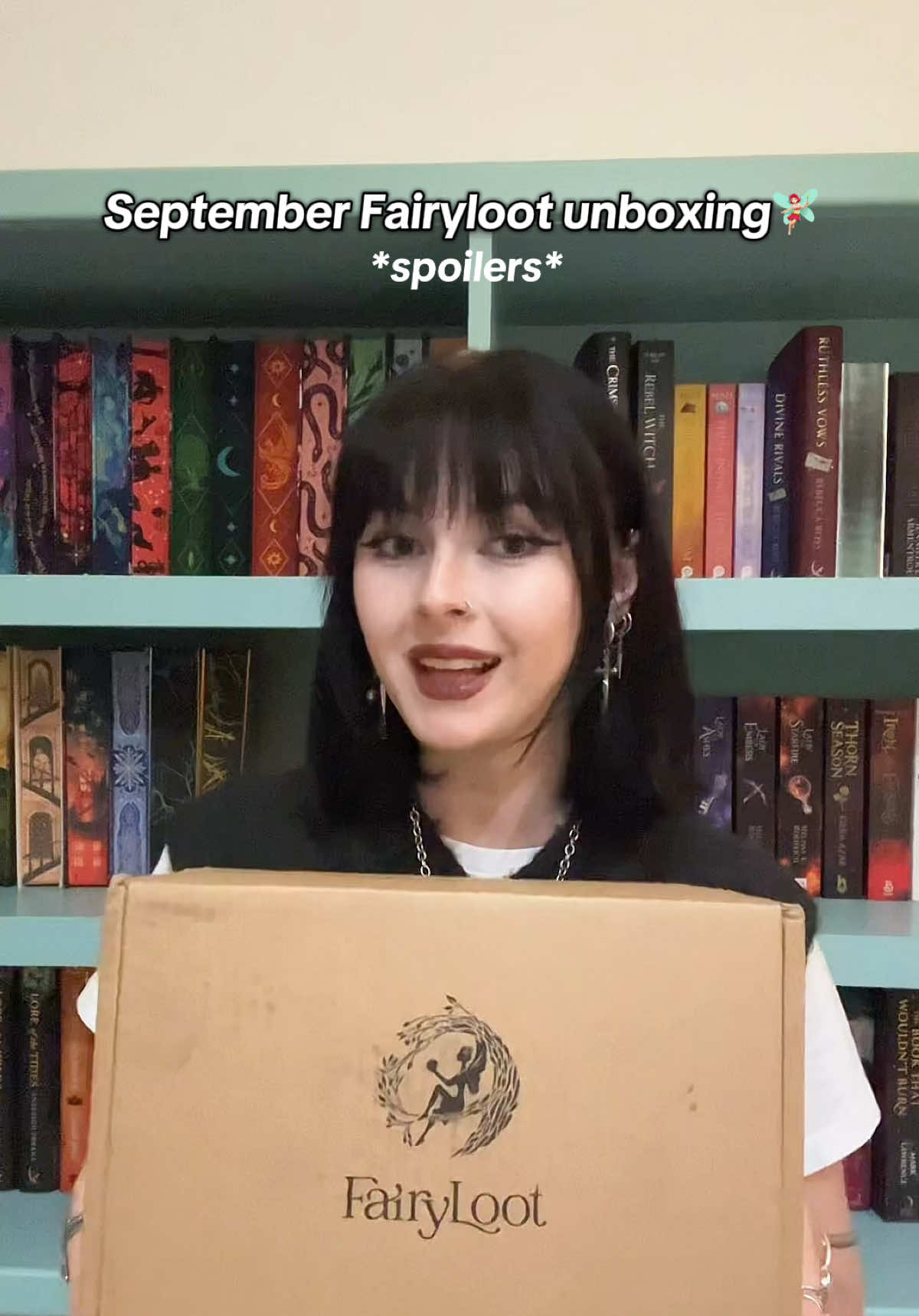 TikTok post by @bookswithgray for FairyLoot. Caption reads: [...] be Alchemised 🖤 you can get 10% off....