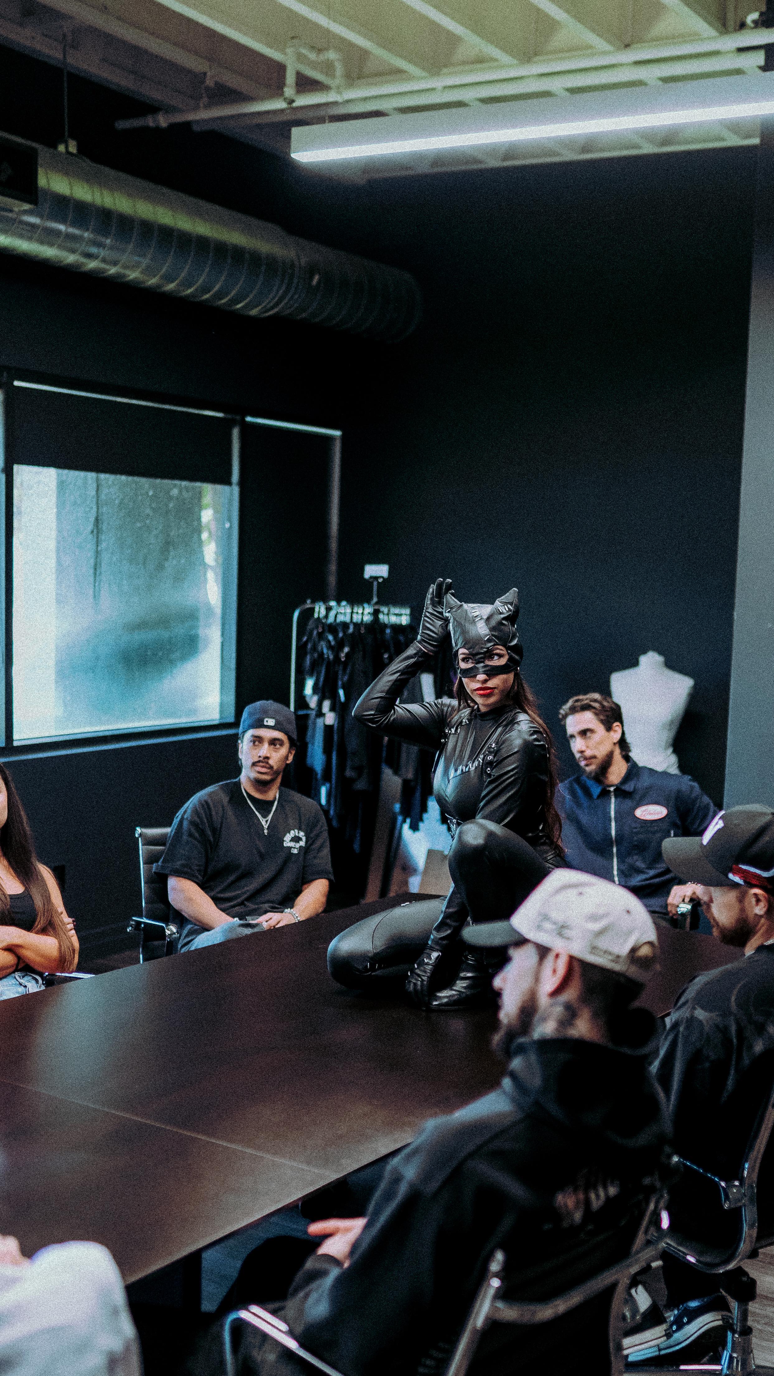 Instagram post by @miny_miranda for Darc Sport. Caption reads: Cat woman causing some major issues here at HQ.....