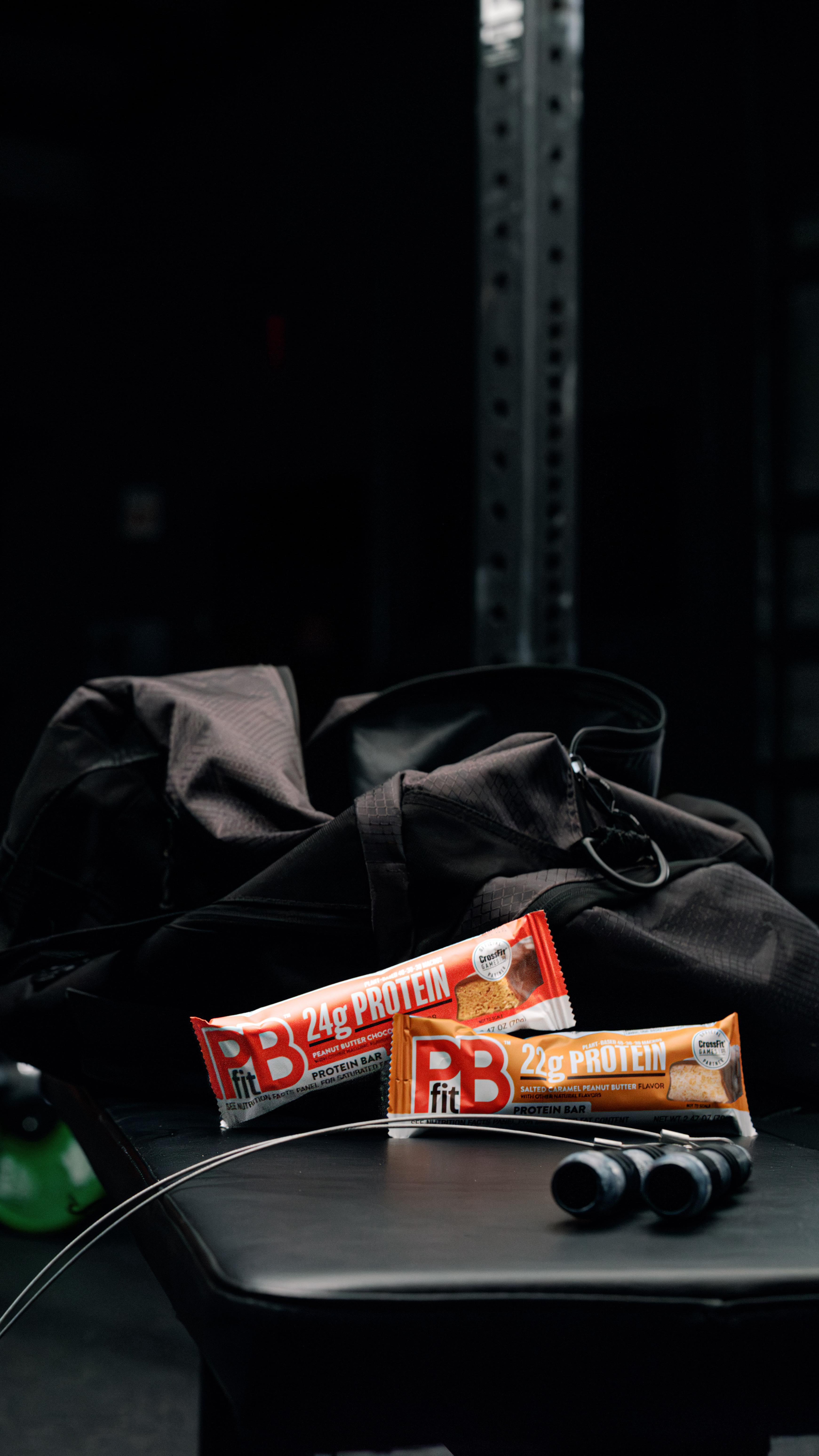 Instagram post by an influencer for CrossFit. Caption reads: [...] Official Protein Bar of the CrossFit....